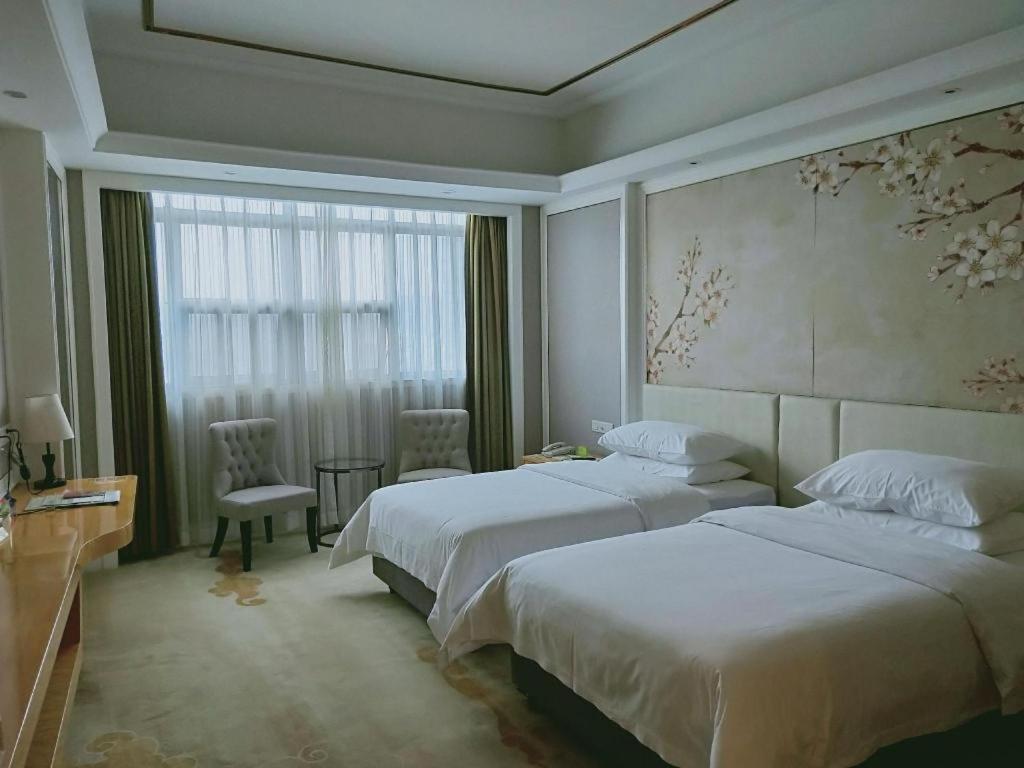เวียนนา อินเตอร์เนชั่นแนล เสินเจิ้น เทียนอัน ดิจิทัล ซิตี้ Hotel เซินเจิ้น ภายนอก รูปภาพ